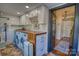 Well-organized laundry room with butcher block countertops and ample storage at 803 Catawba St, Belmont, NC 28012