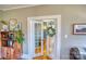 Elegant living room featuring french doors leading into dining room with a decorative wreath at 803 Catawba St, Belmont, NC 28012