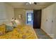 Bright main bedroom with hardwood floors, barn door, and closet at 803 Catawba St, Belmont, NC 28012