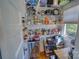 Organized pantry with ample shelving for food storage and beverage refrigerator at 803 Catawba St, Belmont, NC 28012