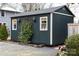 Well-maintained shed with neutral trim, featuring a practical space for storage or hobbies at 803 Catawba St, Belmont, NC 28012