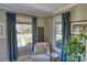 Cozy sitting area with natural light and a comfortable chair at 803 Catawba St, Belmont, NC 28012
