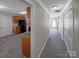 Cozy home featuring a tiled floor, kitchen cabinets and black appliances at 808 Raindrops Rd, Gastonia, NC 28054