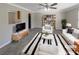 Bright living room boasts stylish decor with hardwood floors, built-in bookcase and a cozy atmosphere at 808 Raindrops Rd, Gastonia, NC 28054