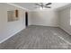 Spacious living room featuring wood floors, neutral wall colors, large windows and natural light at 808 Raindrops Rd, Gastonia, NC 28054