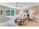 Comfortable bedroom with neutral decor, bedside tables and lamps at 8618 Frank Grier Rd # 58, Charlotte, NC 28215