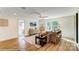Bright and spacious living room with a ceiling fan, television, and cozy seating, creating a comfortable area at 8618 Frank Grier Rd # 58, Charlotte, NC 28215