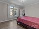 Bedroom with recessed lighting and access to bathroom and closet at 9087 Treetop Nw Way, Concord, NC 28027