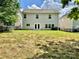 Well-maintained backyard featuring a sturdy fence, lush lawn, and plenty of open space at 9419 Seamill Rd, Charlotte, NC 28278