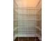 Organized walk-in pantry with multiple rows of white wire shelving at 9419 Seamill Rd, Charlotte, NC 28278