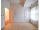Bedroom with window and door to another room at 9539 Errington Ln, Mint Hill, NC 28227