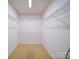 Spacious walk-in closet with wire shelving and neutral carpeting at 9539 Errington Ln, Mint Hill, NC 28227