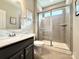 Modern bathroom featuring a glass-enclosed shower, sleek vanity, and contemporary fixtures for a spa-like experience at 9677 Garamont Nw Pkwy, Concord, NC 28027