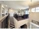 Open-concept living space upstairs with hardwood floors and natural light at 9677 Garamont Nw Pkwy, Concord, NC 28027