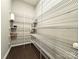 Spacious pantry features ample shelving for organized storage and easy access at 9677 Garamont Nw Pkwy, Concord, NC 28027