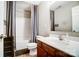 Neutral bathroom with a shower and tub combination and wood style flooring at 9704 Cayenne Dr, Charlotte, NC 28214