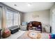 Cozy Bedroom with a crib, chair, and a playful lion-themed rug for a warm and inviting space at 9704 Cayenne Dr, Charlotte, NC 28214