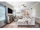 Comfortable living room featuring a plush sectional sofa and stylish accents at 9704 Cayenne Dr, Charlotte, NC 28214