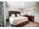 Comfortable main bedroom with a large bed, soft rug, and neutral tones at 9704 Cayenne Dr, Charlotte, NC 28214