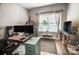 Comfortable office with large window, modern decor and hard wood floors at 9704 Cayenne Dr, Charlotte, NC 28214