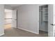 Bright bedroom with carpet flooring and closet featuring organized shelving and hanging space at 108 Kinderston Dr, Davidson, NC 28036