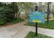 Community boat dock offering residents exclusive access to lake activities, featuring a sign marking it as private for residents at 108 Kinderston Dr, Davidson, NC 28036