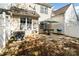 Cozy backyard with mature trees, patio, and outdoor dining set, perfect for entertaining at 10920 Walking Path Ln, Charlotte, NC 28213
