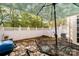 Relaxing patio area featuring outdoor furniture, a grill and privacy fencing at 10920 Walking Path Ln, Charlotte, NC 28213