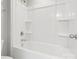 Bright bathroom featuring a shower and tub combination with white tile surround at 110 Lantern Acres Dr, Mooresville, NC 28115