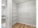 Walk-in closet with wire shelving for storage and organization at 110 Lantern Acres Dr, Mooresville, NC 28115