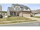 Charming two-story home with a two-car garage and well-maintained front yard at 110 Lantern Acres Dr, Mooresville, NC 28115