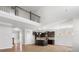 Open concept kitchen with dark cabinets, stainless steel appliances, and hardwood floors at 110 Lantern Acres Dr, Mooresville, NC 28115