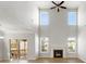 Spacious living room with high ceilings, large windows, and fireplace offer ample natural light and views at 110 Lantern Acres Dr, Mooresville, NC 28115