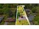Aerial view of property showing home and land, including a spacious yard, surrounded by mature trees at 110 Tanglewood Dr, Kannapolis, NC 28081