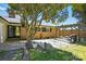 Expansive backyard with pergola and seating, offering a blend of relaxation and outdoor charm at 110 Tanglewood Dr, Kannapolis, NC 28081