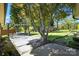 Serene backyard with a pergola, seating area, and lush greenery perfect for outdoor relaxation at 110 Tanglewood Dr, Kannapolis, NC 28081