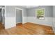 Spacious bedroom with hardwood floors and natural light at 110 Tanglewood Dr, Kannapolis, NC 28081