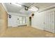 Spacious garage with ample storage and parking potential, featuring dual entry doors at 110 Tanglewood Dr, Kannapolis, NC 28081