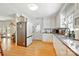 Spacious kitchen with modern appliances, ample cabinet space, and a view into a living area at 110 Tanglewood Dr, Kannapolis, NC 28081