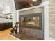 Cozy living room featuring a fireplace with decorative accents and a mounted television at 110 Tanglewood Dr, Kannapolis, NC 28081