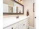 Bathroom features a large mirror, white vanity, and classic fixtures at 112 Spring Branch Rd, Fort Mill, SC 29715