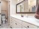 Bright bathroom features a white vanity, large mirror, and tile flooring at 112 Spring Branch Rd, Fort Mill, SC 29715