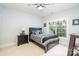 Cozy bedroom features plush carpet, natural light, and a ceiling fan at 112 Spring Branch Rd, Fort Mill, SC 29715