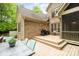 Outdoor deck featuring a grill, dining area, and access to a screened porch perfect for al fresco dining at 112 Spring Branch Rd, Fort Mill, SC 29715