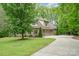 Beautiful home with a well-maintained lawn, long driveway, and attached garage perfect for suburban living at 112 Spring Branch Rd, Fort Mill, SC 29715