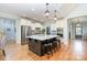 Modern kitchen features a large island, stainless steel appliances, and open layout for easy entertaining and cooking at 112 Spring Branch Rd, Fort Mill, SC 29715