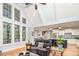 Open living space with vaulted ceilings, large windows, and hardwood floors at 112 Spring Branch Rd, Fort Mill, SC 29715