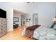 Spacious main bedroom with hardwood floors, vaulted ceilings, and a sitting area at 112 Spring Branch Rd, Fort Mill, SC 29715