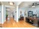 Well-lit office space with hardwood floors, large desk, and blue accent wall at 112 Spring Branch Rd, Fort Mill, SC 29715