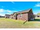 Brick house with bay window, nice yard, and AC unit at 115 Green Sw St, Concord, NC 28027